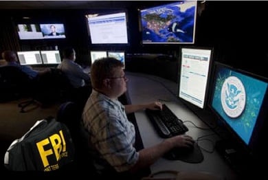 FBI agent at a computer in a data center
