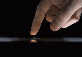 finger glow touch pad screen black crop.png