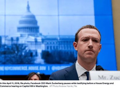 Photo of Mark Zuckerberg with an image of the U.S. Capitol Building behind him.
