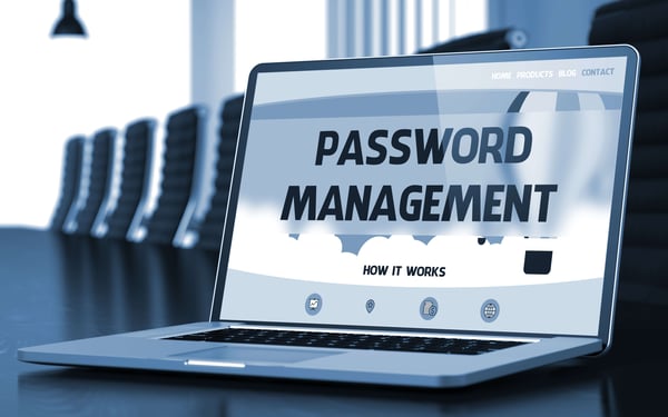 password manager on laptop in conf room black and white