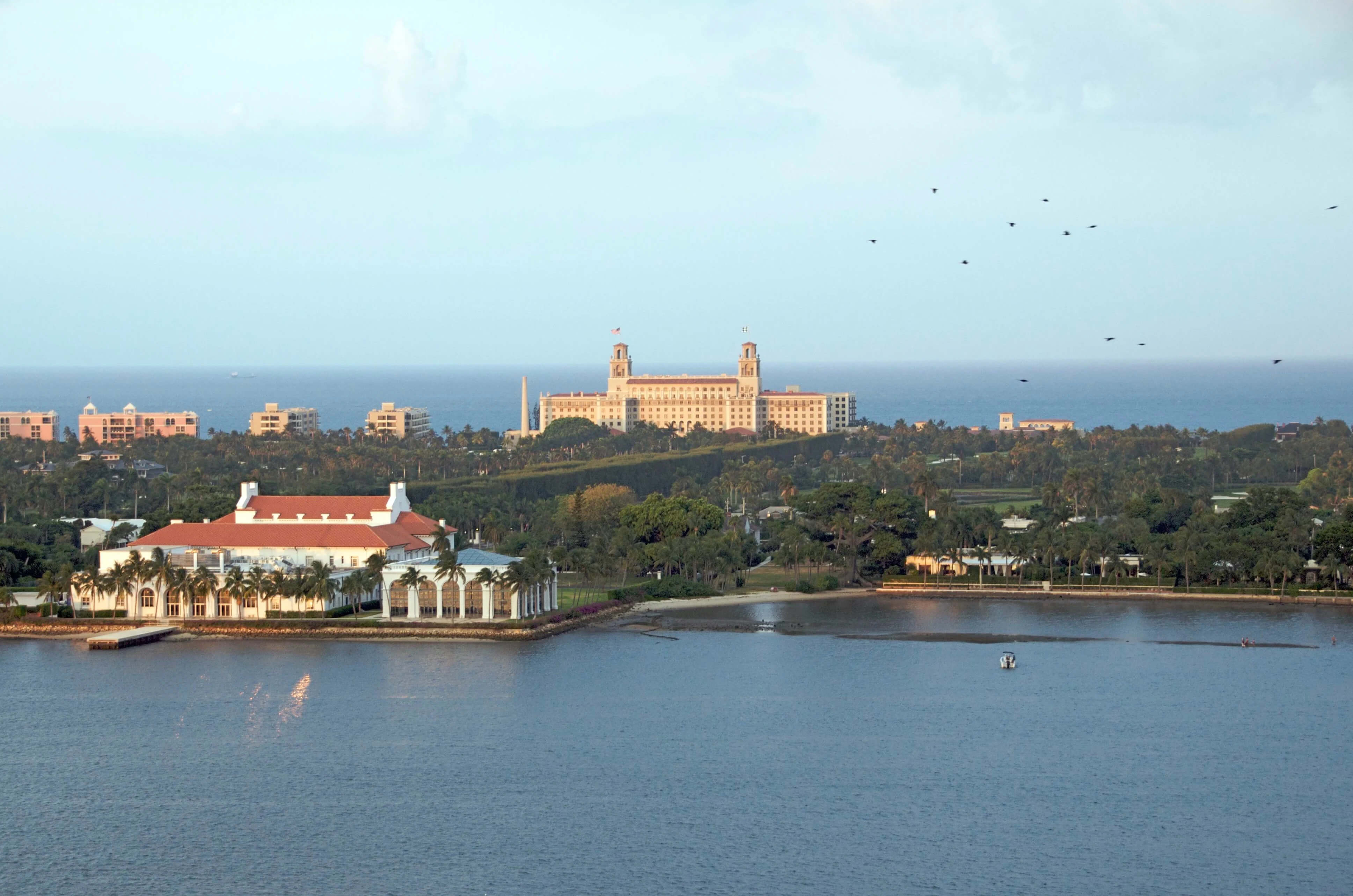 aerial view over the intracoastal water of Palm beach looking at the Breakers Hotel out to the Atlantic Ocean