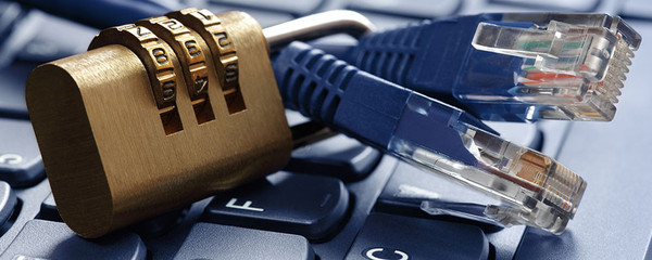 photo image of blue LAN cables on a keyboard with a combination lock for home network cybersecurity